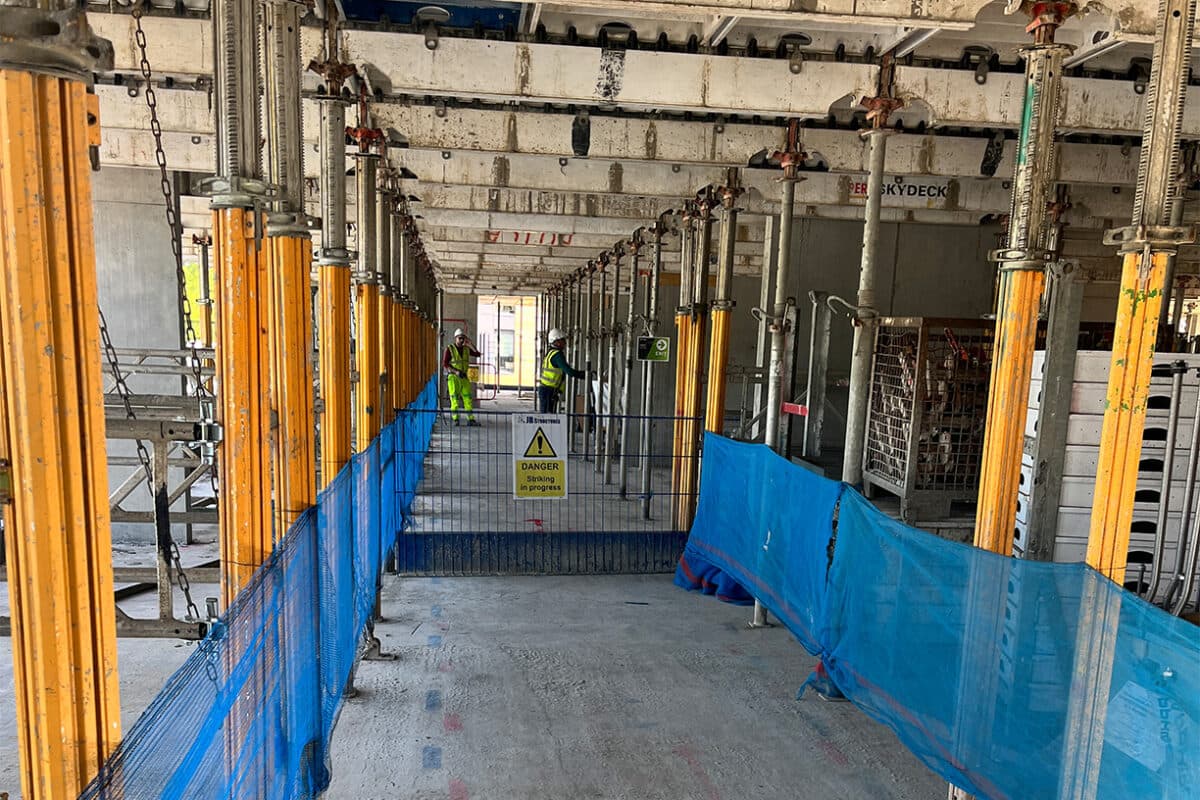 Construction site with workers in high-visibility clothing